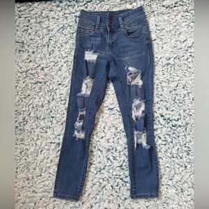Distressed 5/8 length skinnies